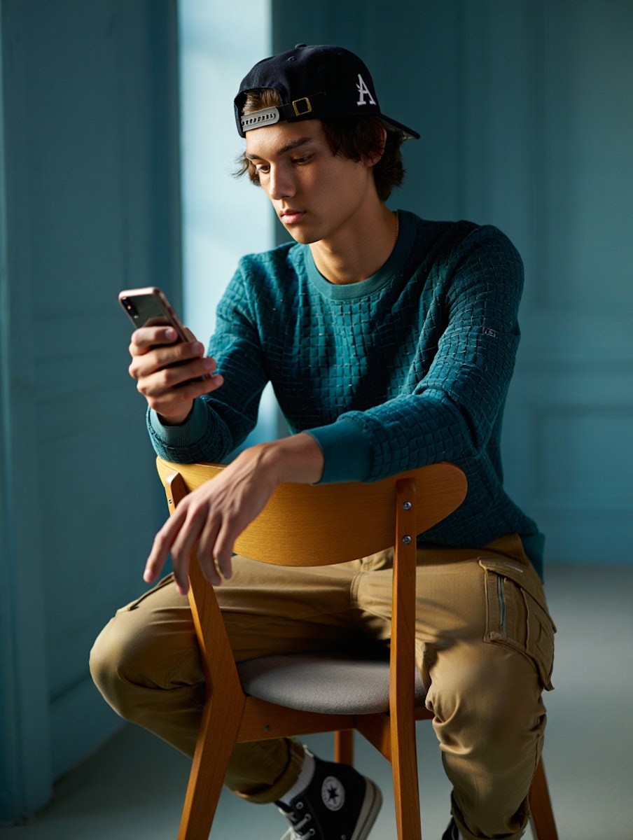 Branded content Man Relaxing with Phone
